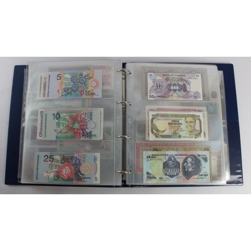 931 - World (280+), an album of mixed world notes to include Bermuda 1 Pound 1957, East Africa 1 Shilling ... 