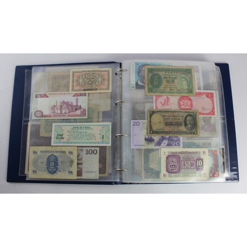 931 - World (280+), an album of mixed world notes to include Bermuda 1 Pound 1957, East Africa 1 Shilling ... 