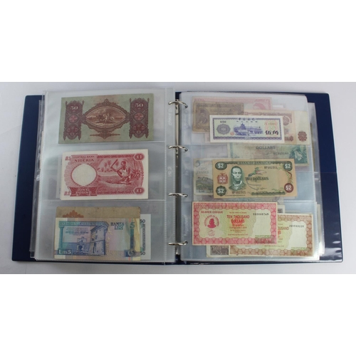 931 - World (280+), an album of mixed world notes to include Bermuda 1 Pound 1957, East Africa 1 Shilling ... 