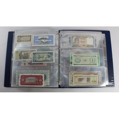 931 - World (280+), an album of mixed world notes to include Bermuda 1 Pound 1957, East Africa 1 Shilling ... 