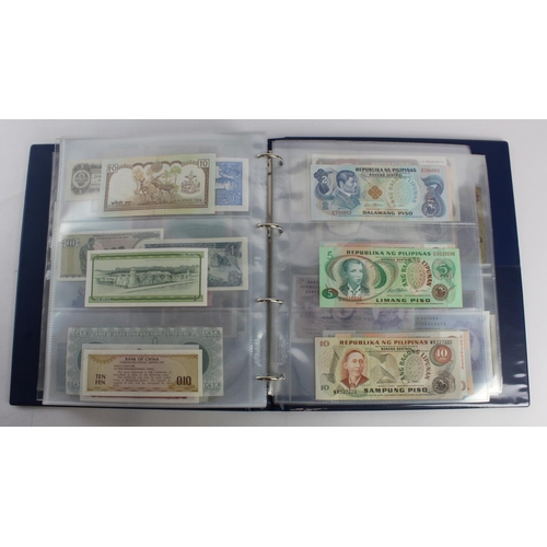 931 - World (280+), an album of mixed world notes to include Bermuda 1 Pound 1957, East Africa 1 Shilling ... 