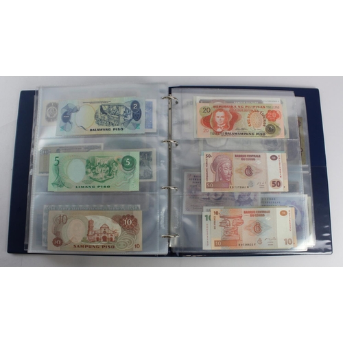 931 - World (280+), an album of mixed world notes to include Bermuda 1 Pound 1957, East Africa 1 Shilling ... 