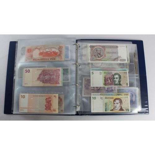 931 - World (280+), an album of mixed world notes to include Bermuda 1 Pound 1957, East Africa 1 Shilling ... 