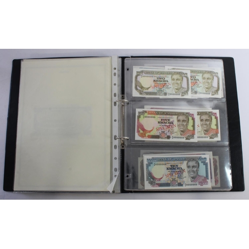 935 - World (33), an unusual album of SPECIMEN notes including 2 A4 pages showing the back and front of th... 