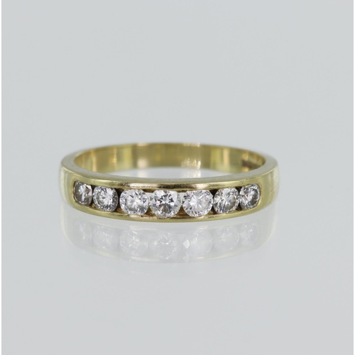 1 - 18ct yellow gold diamond half eternity ring, seven round brilliant cuts, TDW approx. 0.70ct, channel... 