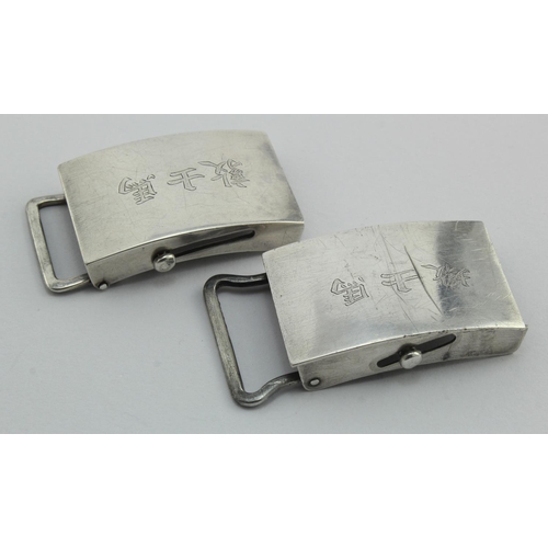 1012 - Two Chinese silver buckles c1900 both bear Chinese silver marks on their reverses - both measure app... 