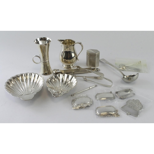 1097 - Mixed silver. A collection of various silver hallmarked items, including blank decanter labels, shel... 