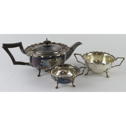 1106 - Silver three piece tea set, comprising tea pot (engraved to side), milk jug & sugar bowl, hallmarked... 