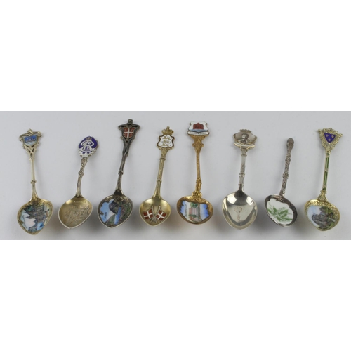 1107 - Enamel Teaspoons. A group of eight mostly silver & white metal enamel decorated teaspoons, including... 