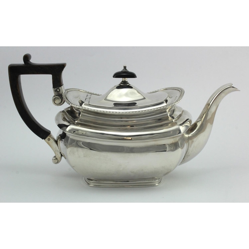 1108 - Silver teapot, hallmarked 'ECo, Birmingham 1911', length 28.5cm approx., weight 25.6oz. approx.