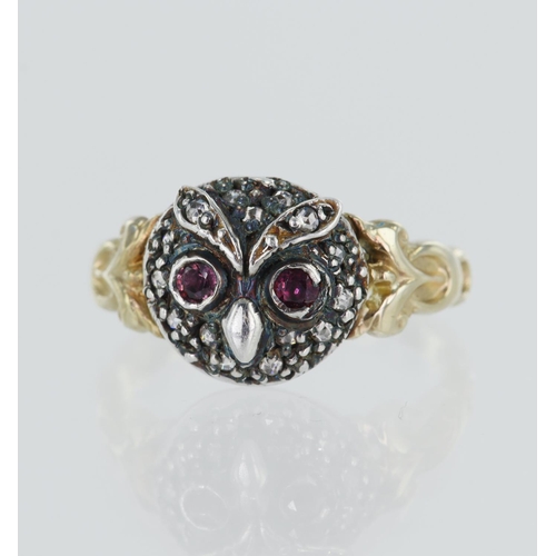 111 - Yellow gold (tests 14ct) owl ring, set with round faceted eyes measuring 2mm, surrounded with fiftee... 