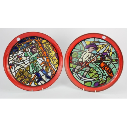 1141 - Poole Pottery. Two Poole pottery plates from the Medieval Calendar series, circa 1970s, comprising F... 