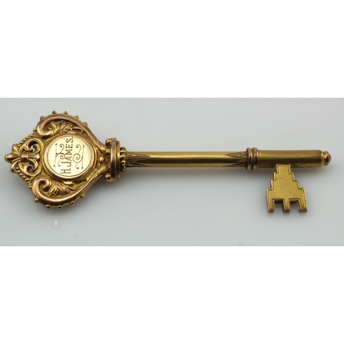 1147 - 9ct Gold Presentation Key, hallmarked Birmingham 1931?, with presentation inscription. Length 91mm, ... 