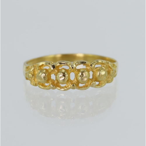 12 - Yellow gold (tests higher than 18ct) dress ring, finger size P, weight 2.6g.