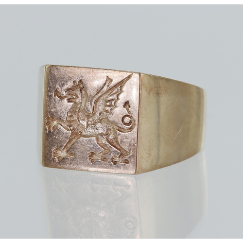 21 - 9ct yellow gold signet ring, engraved with the Red Dragon of Cadwaladr, square table measures approx... 