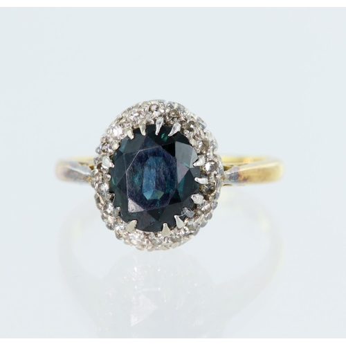 30 - Yellow gold (tests 18ct) diamond and teal sapphire cluster ring, sapphire measures approx. 8mm x 7mm... 