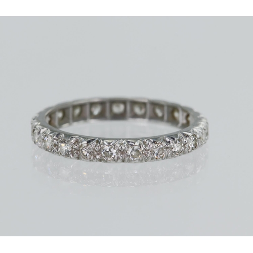 32 - White gold (tests 18ct) diamond full eternity ring, TDW approx. 0.34ct, set with twenty-three round ... 