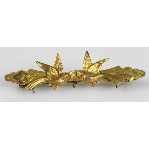 372 - Yellow gold (tests 9ct) antique swallow sweetheart brooch, length 46mm, weight 1.8g.