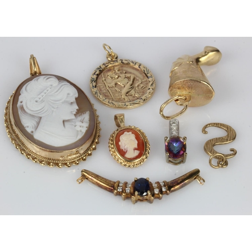 384 - Seven 9ct gold/tests 9ct pendants, stones include diamond, sapphire, carved shell, mystic topaz, tot... 