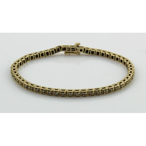 387 - Yellow gold (tests 14ct) diamond set line bracelet, fifty-two round brilliant cut diamonds TDW appro... 