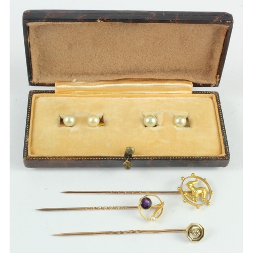 388 - Assortment of 9ct gold/tests 9ct stick pins and dress studs, three stick pins, one diamond set pin s... 