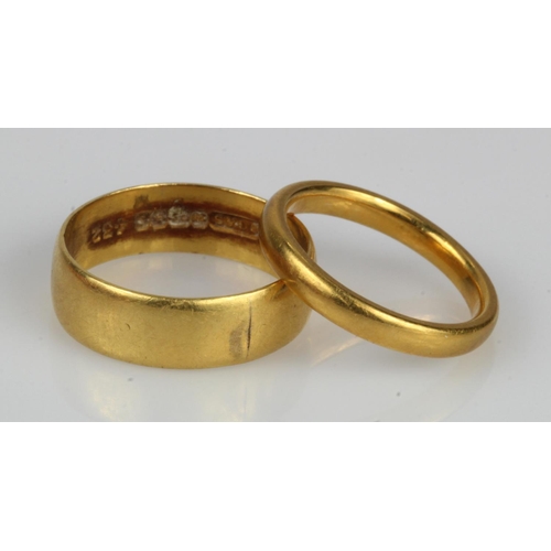 405 - Two 22ct gold rings, 2.5mm court finger size J, 6mm D-shape finger size O/P, total weight 8.5g.