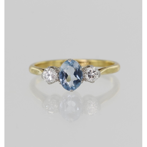 41 - Yellow gold (tests 18ct) vintage diamond and aquamarine trilogy ring, one oval sky blue aquamarine m... 