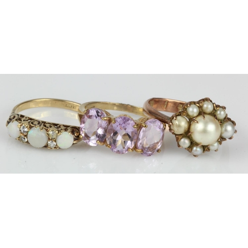 425 - Three 9ct gold/tests 9ct dress rings, stones include amethyst, pearl, opal and CZ, finger sizes Px2 ... 