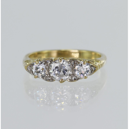 43 - 18ct yellow gold diamond trilogy ring, TDW approx. 0.90ct, principal diamond approx. 0.54ct, set wit... 