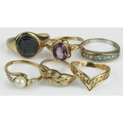 434 - Six 9ct gold/tests 9ct rings, stones include diamond, cultured pearl, amethyst, hematite, finger siz... 