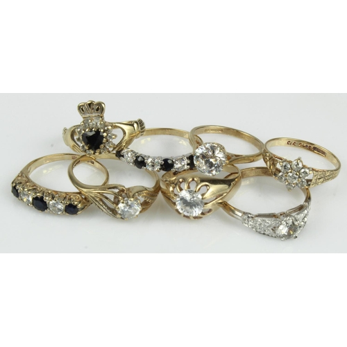 442 - Eight 9ct gold/tests 9ct rings, set with CZ's and sapphires, finger sizes include J/K, Kx2, L, L/M, ... 