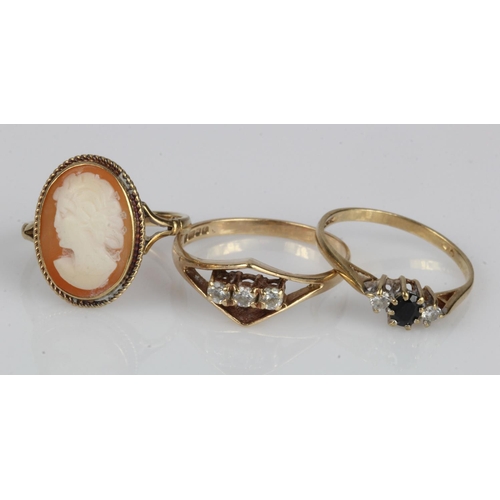 449 - Three 9ct gold rings, stones include sapphire, carved shell cameo and CZ, finger sizes J/K, L, P, to... 