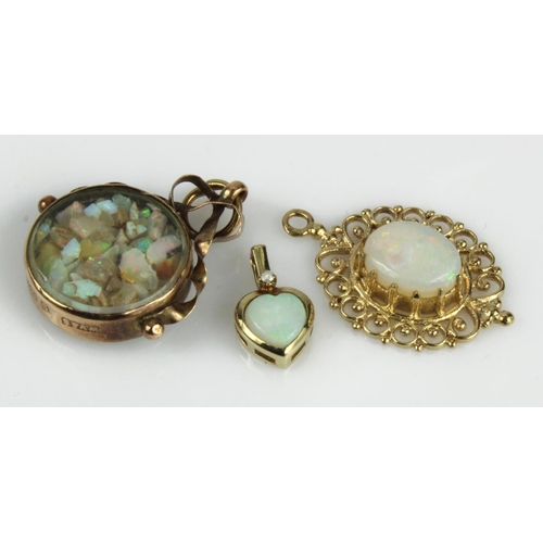 470 - Three 9ct gold opal pendants , total weight 6.5g.