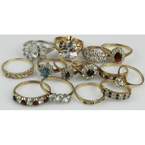 481 - Fourteen 9ct gold/tests 9ct dress rings, set with CZ's/paste stones, total weight 32.8g.