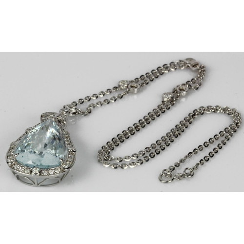 492 - White gold (tests 18ct) diamond and aquamarine necklace, pear shaped aquamarine approx. 23.20ct, sur... 