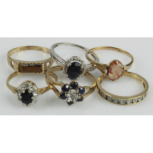 493 - Six 9ct gold/tests 9ct rings, stones include diamond, sapphire, tigers eye and cameo shell, finger s... 