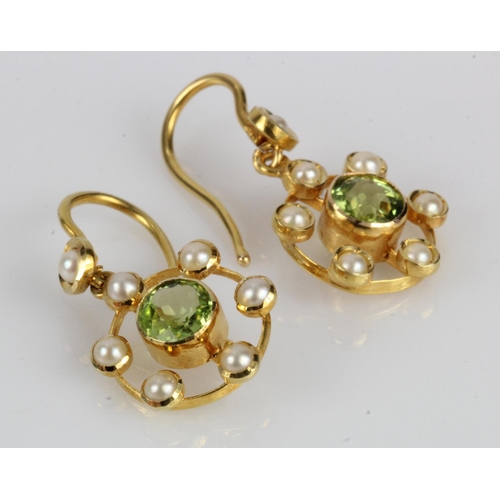 496 - Yellow gold (tests 15ct) Edwardian drop earrings, set with one peridot and seven half pearls in each... 