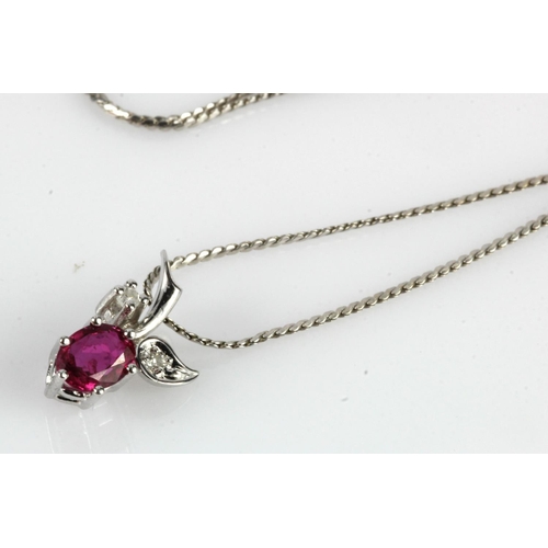 501 - White gold (tests 18ct) diamond and ruby necklace, ruby measures 5.5mm x 4mm, set with two diamonds,... 