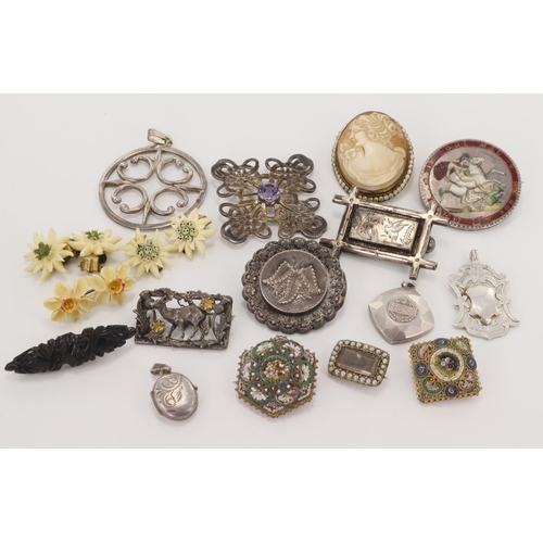 503 - Mixed lot of five silver and white metal pendants. Ten silver, white and yellow metal brooches, and ... 