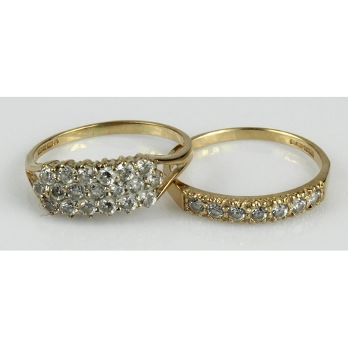 512 - Two 14ct yellow gold rings, both set with CZ, finger size R and S, total weight 4.9g.