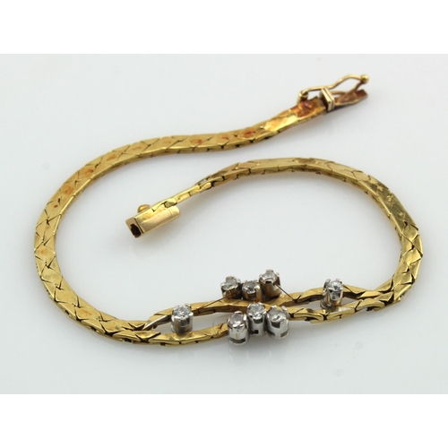 528 - Yellow gold (tests 18ct) bracelet, set with eight round CZs, length 7