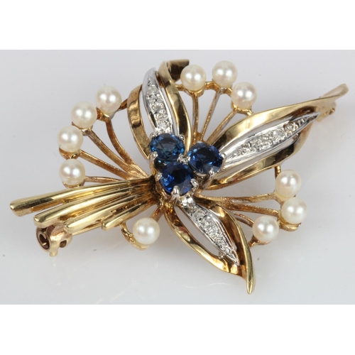 537 - 9ct yellow gold floral brooch, set with diamonds TDW approx. 0.04ct, three approx. 4mm sapphires and... 