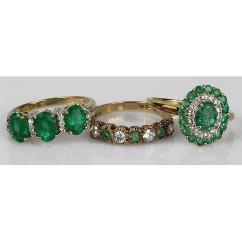 538 - Three 9ct gold emerald and CZ dress rings, finger sizes include M/N and P/Q, total weight 8.1g.