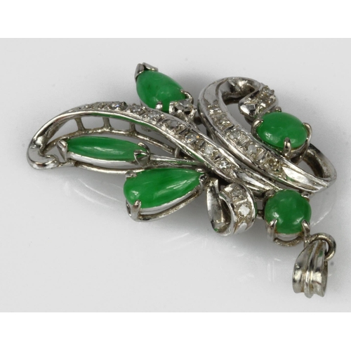 540 - White gold (tests 14ct) diamond and jade pendant, five cabochon jadeite jades surrounded by ribbons ... 