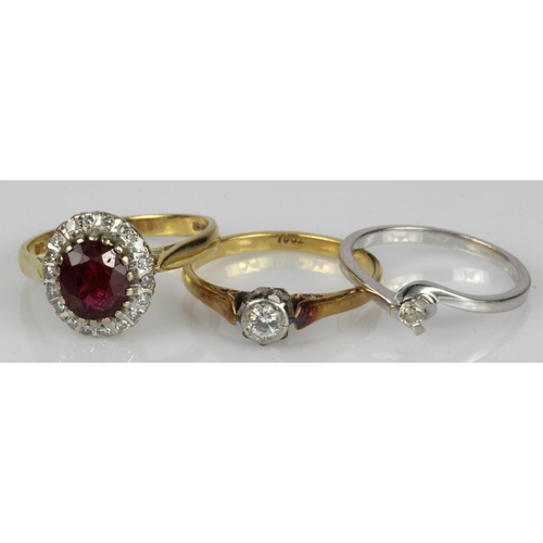 547 - Three 18ct gold/tests 18ct rings, stone include diamond and flux filled ruby, finger sizes L, O/P, P... 