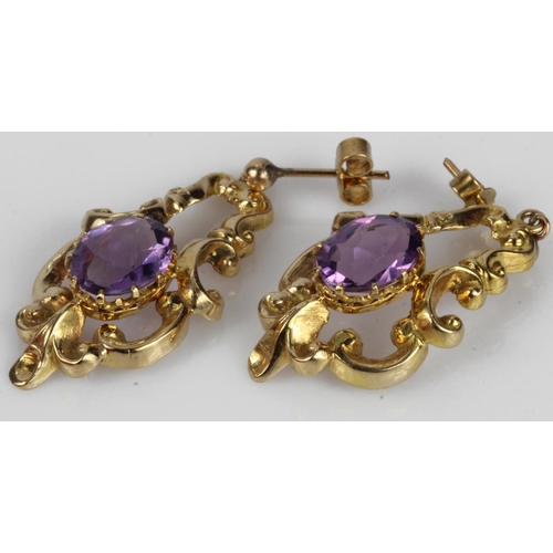 548 - 9ct yellow gold Georgian repousse style drop earrings, each set with one approx. 10mm x 8mm amethyst... 