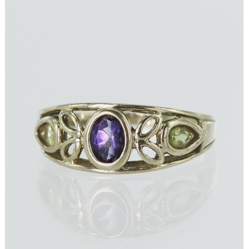 55 - 9ct yellow gold contemporary suffragette ring, set with one oval amethyst and two pear shaped perido... 