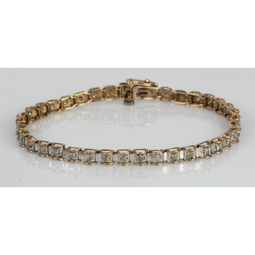 559 - 9ct yellow gold diamond bracelet, thirty-eight round brilliant cuts TDW 1ct, length 7.3