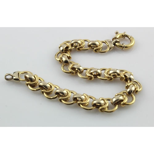 567 - Yellow gold (tests 18ct) fancy linked bracelet, white gold linked details, feature bolt ring clasp, ... 