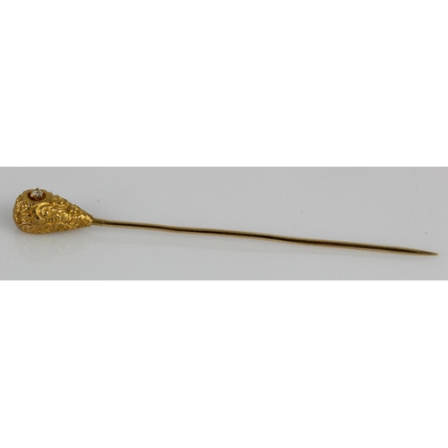 580 - Yellow gold (tests 14ct) stick pin, set with one single cut paste stone, length 70mm, weight 1.5g.